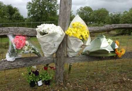 Floral tributes at the accident scene. Picture: DAVE DOWNEY