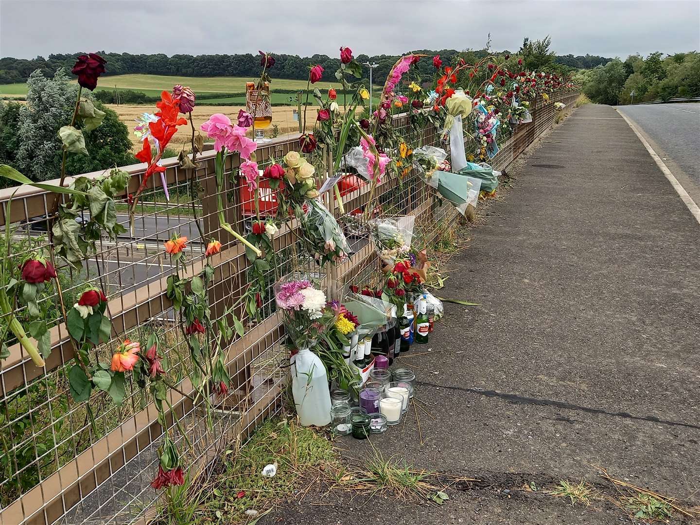 Floral tributes have been left on the bridge where Lee Harlow tragically lost his life