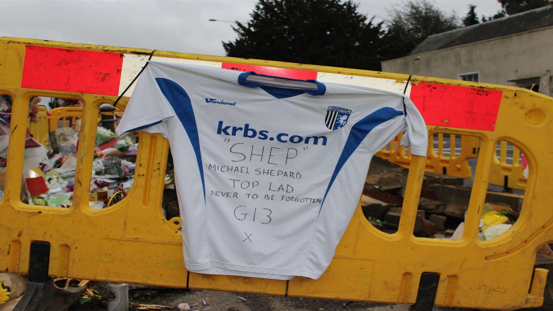 A football shirt left in tribute to Michael Shepherd