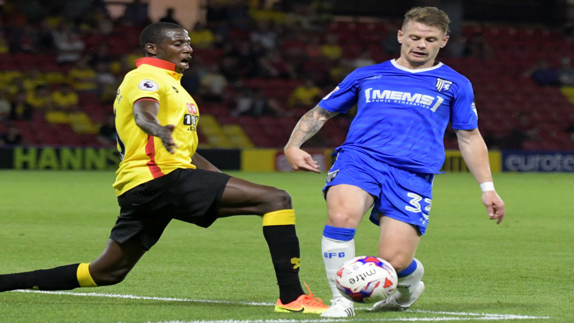 Mark Byrne in action for Gillingham against Watford Picture: Barry Goodwin