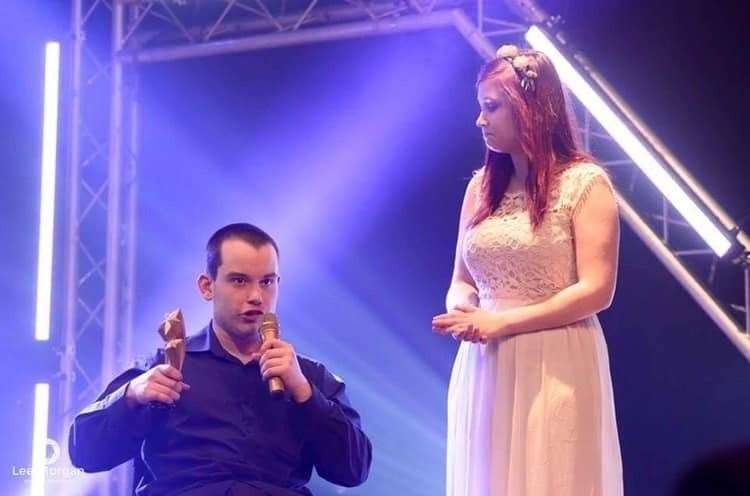 Charlotte presenting Ben Wallis with an award for his charity work. (17685147)