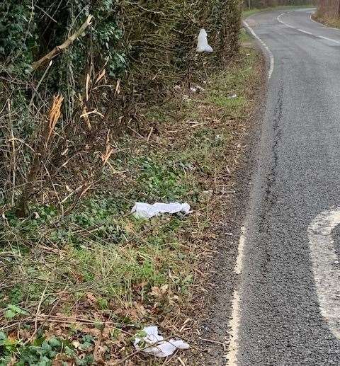 A trail of white paper was also along Oak Grove Lane
