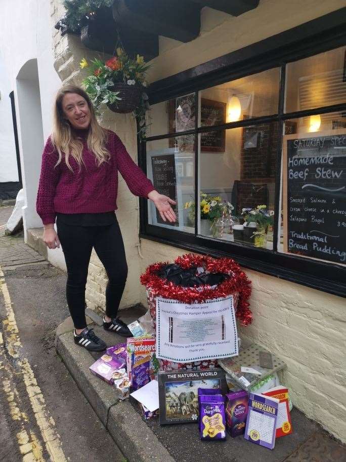 Emillie Hobden collecting some Christmas hamper donations from the Bean Rush Cafe in West Malling