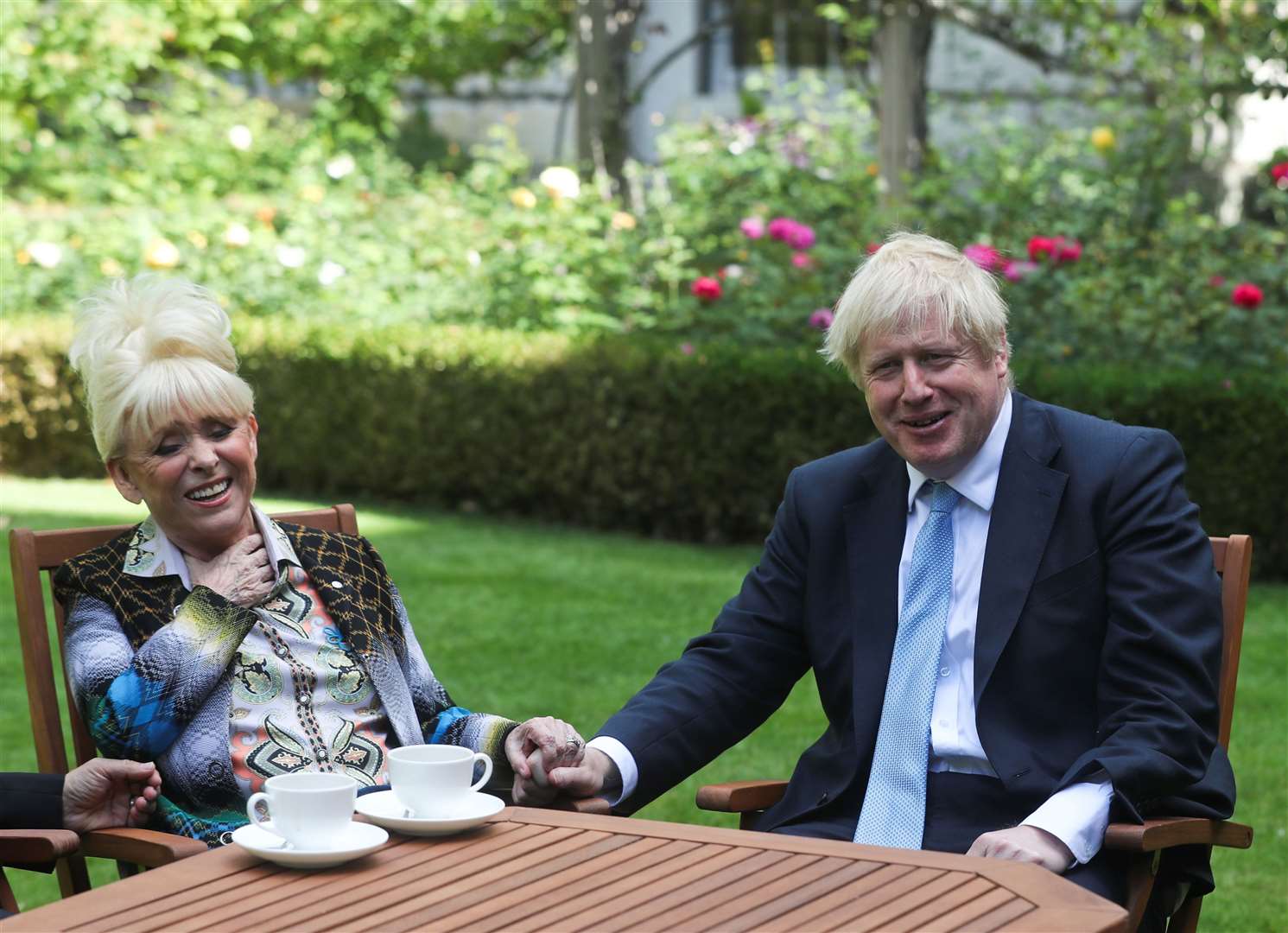 Dame Barbara Windsor met former prime minister Boris Johnson in the Downing Street garden to discuss dementia care (PA)
