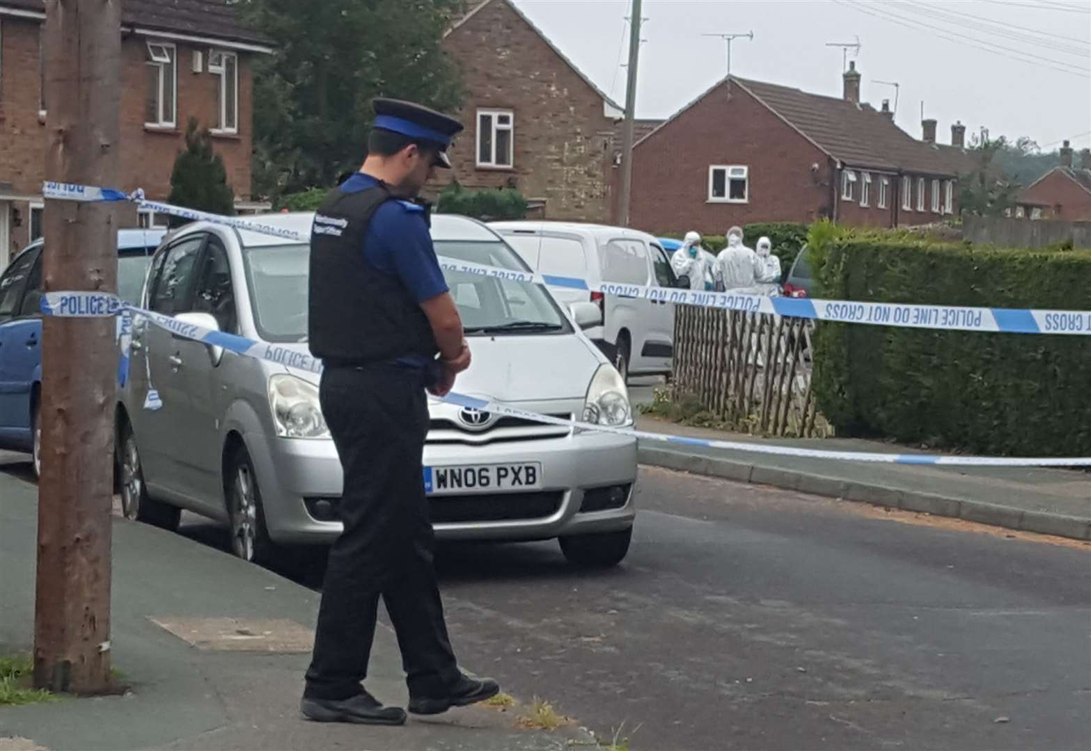 Police have cordoned off the street and forensics are in attendance