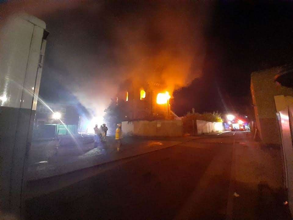 Flames have taken hold in the old building. Picture: Phil Crowder