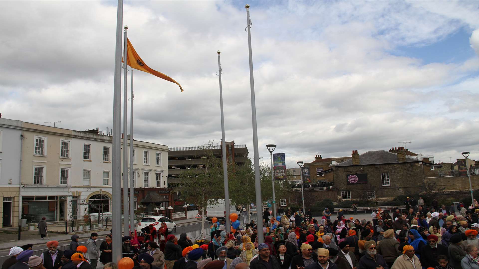 The flag was raised in Community Square to mark the start of Vaisakhi. Picture: Gravesham Borough Council