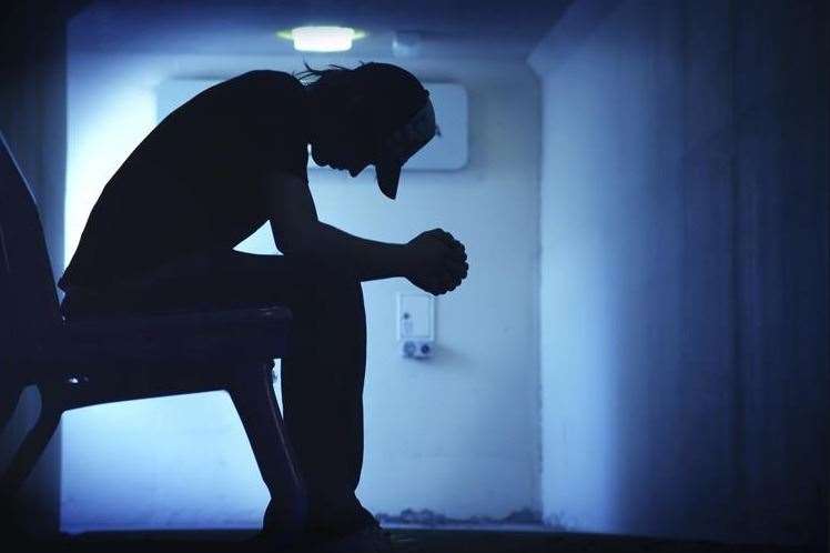 Three times as many men as women die by suicide and men aged 40-49 have the highest suicide rates in the UK. Stock Image