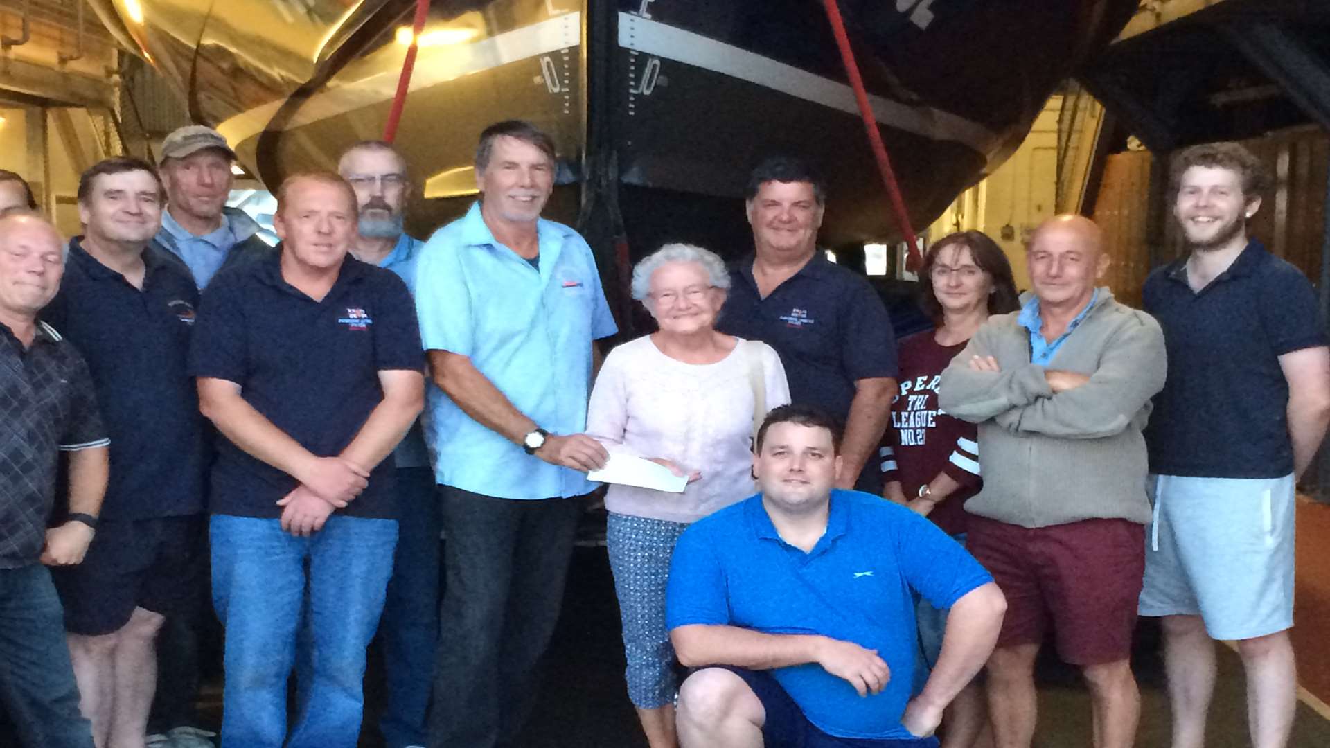 The Stanley family met volunteers at the RNLI Lifeboat station and presented a cheque for £805.13. Pic courtesy of RNLI