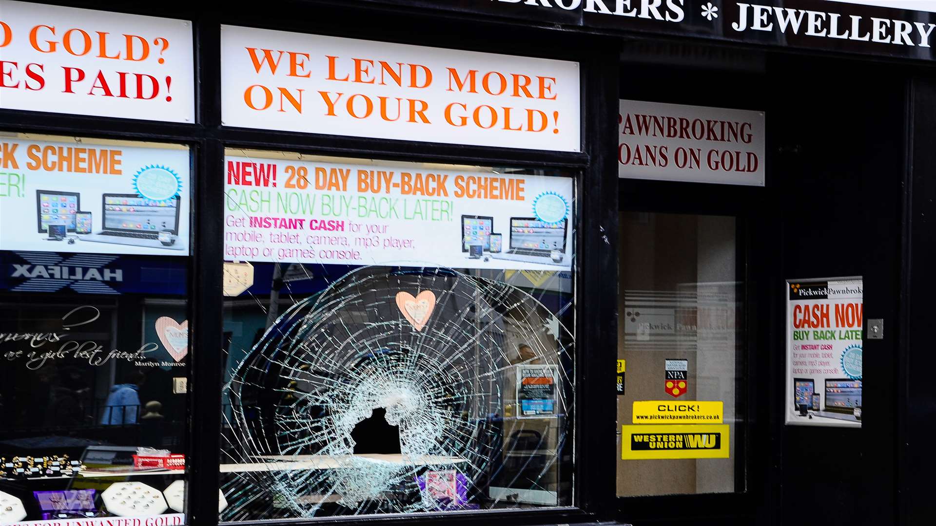 The smashed shop window. Picture: Alan Langley