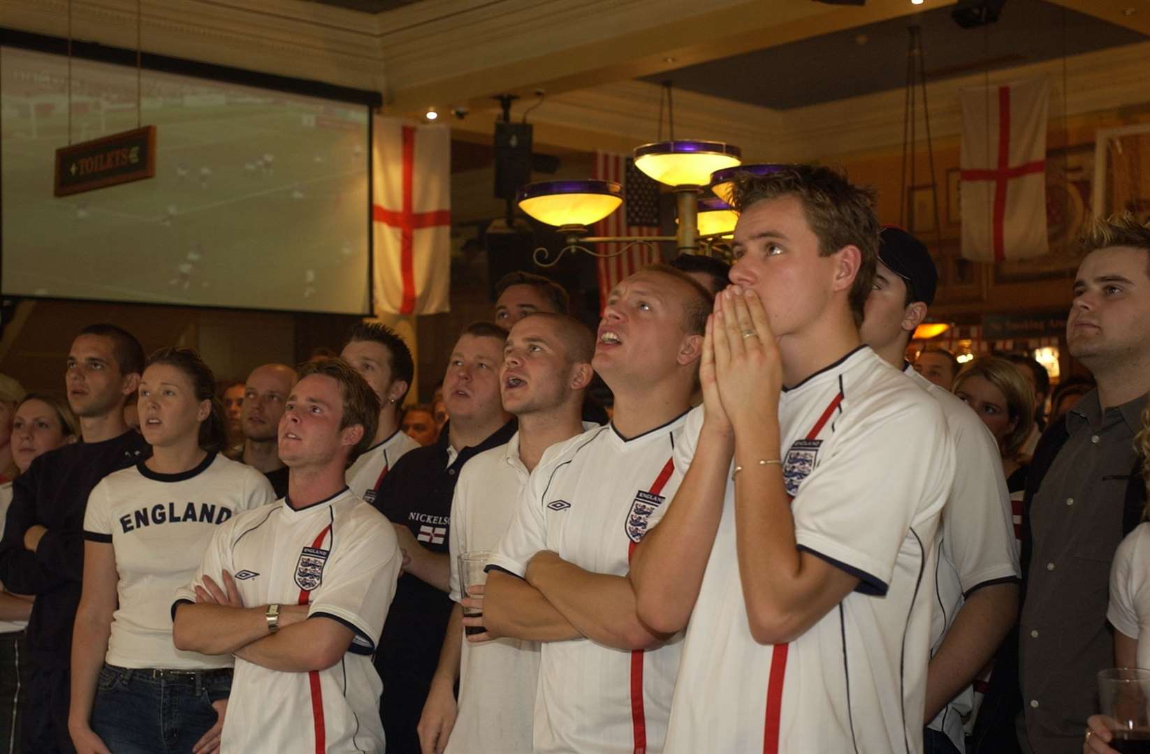 Fans watch the second half of England v Brazil at The Litten Tree, Dartford