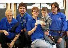 Queenborough Archers, pictured with Oliver Smith, have raised more than £1,300 for the appeal