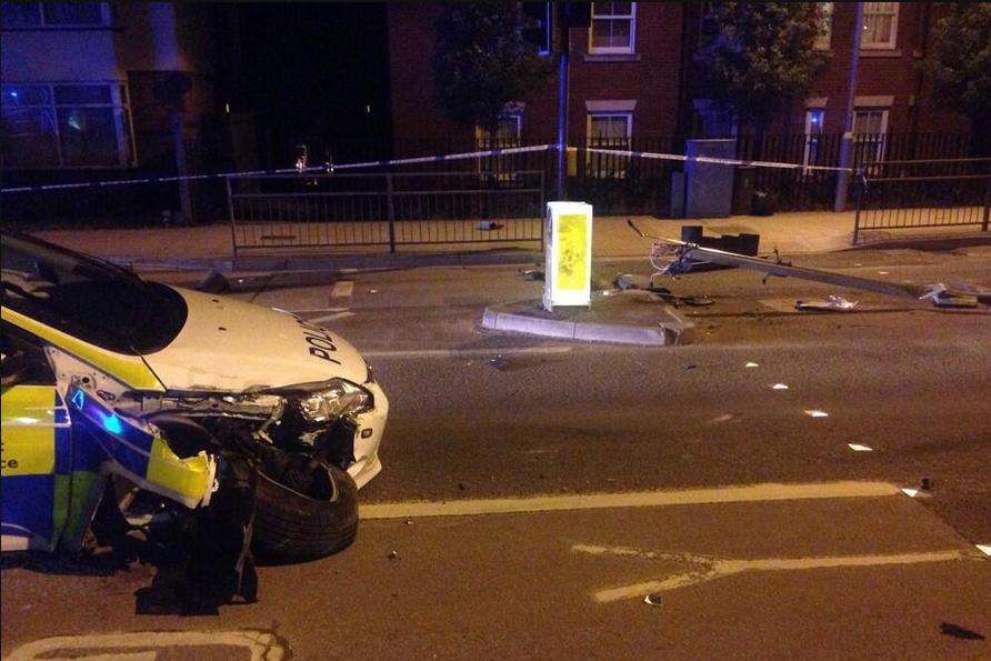 A police car was badly damaged in a crash in Canterbury