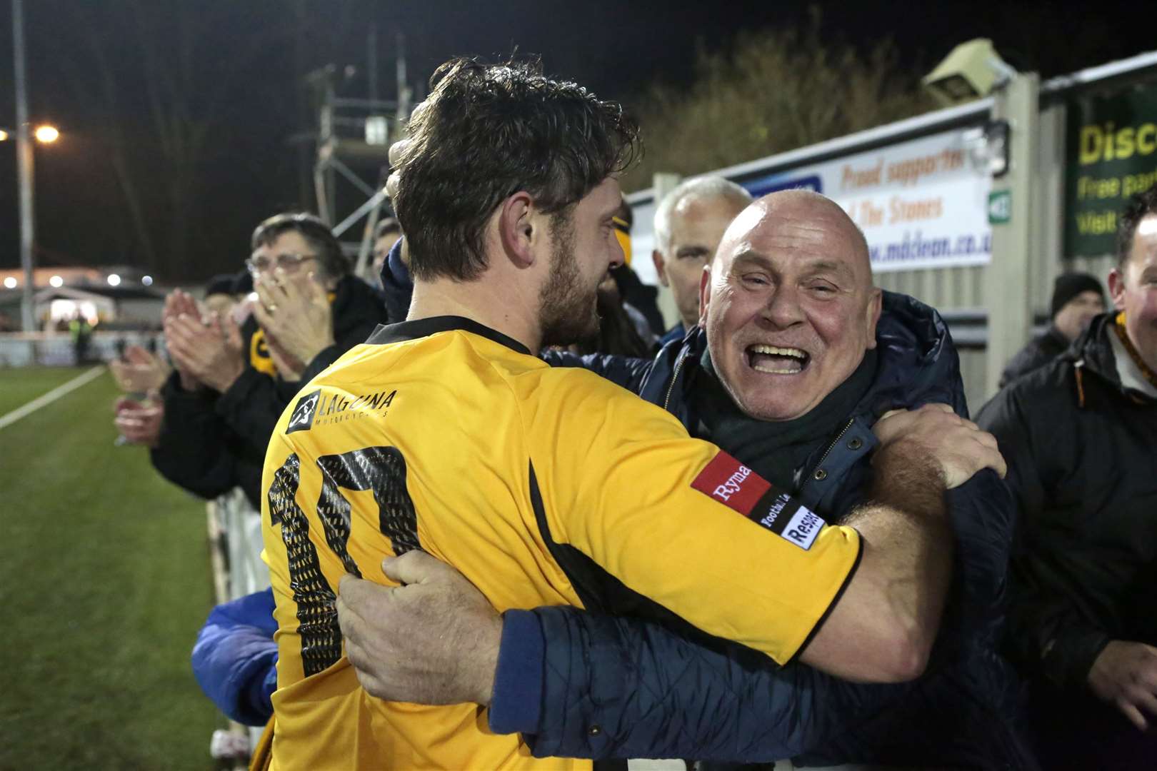 Frannie Collin celebrates with his dad after Maidstone’s replay win over Stevenage. Picture: Martin Apps