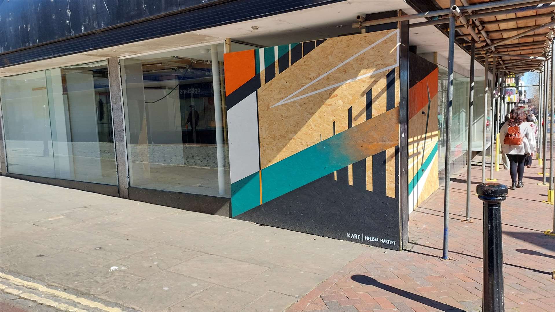 Melissa Hartley and Karc's mural in the high street