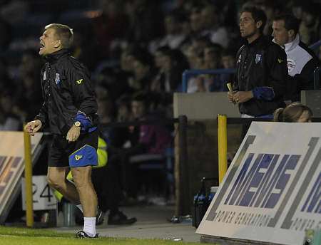 Manager Andy Hessenthaler leaves the bench to shout instructions