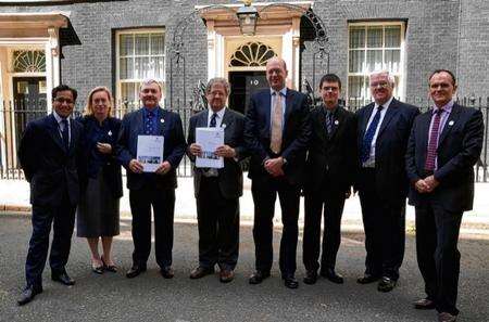 The bid team outside Number 10. From left: Rehman Chishti MP, Geraldine Allinson, KM Group chairman, Cllrs Alan Jarrett and Rodney Chambers, Mark Reckless MP, Richard Ogle, Medway Youth Parliament chaiman, Cllr Howard Doe and Neil Davies, Medway Council chief executive