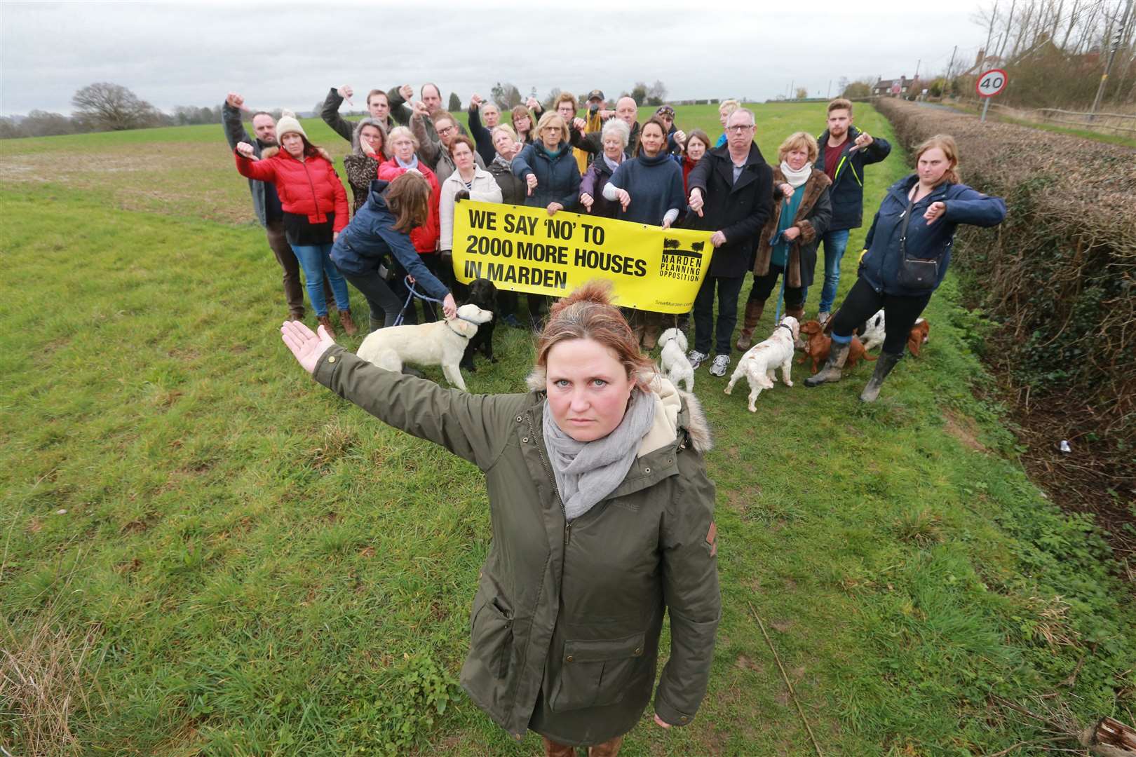 Campaigners on the land where 2,000 homes are proposed in the small Marden village. Picture: John Westhrop