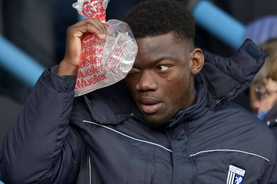 Deji Oshilaja tends to his injured eye on Saturday Picture: Barry Goodwin