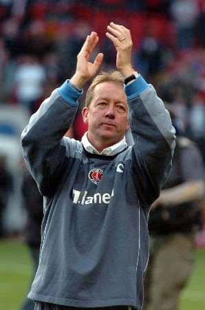Alan Curbishley applauds the fans for their support after the final whistle of his last game in charge at The Valley. Picture by MATTHEW WALKER