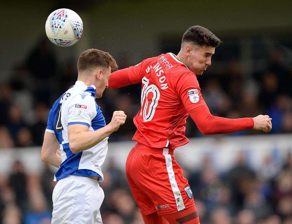 Conor Wilkinson challenges for the ball Picture: Ady Kerry