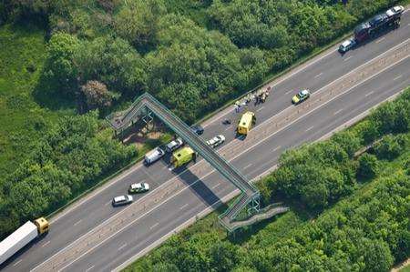 Air ambulance lands on the A228 near the Hop Farm after a motorcycle is involved in an accident.