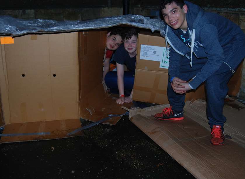 Students were given a piece of cardboard to sleep under for the night
