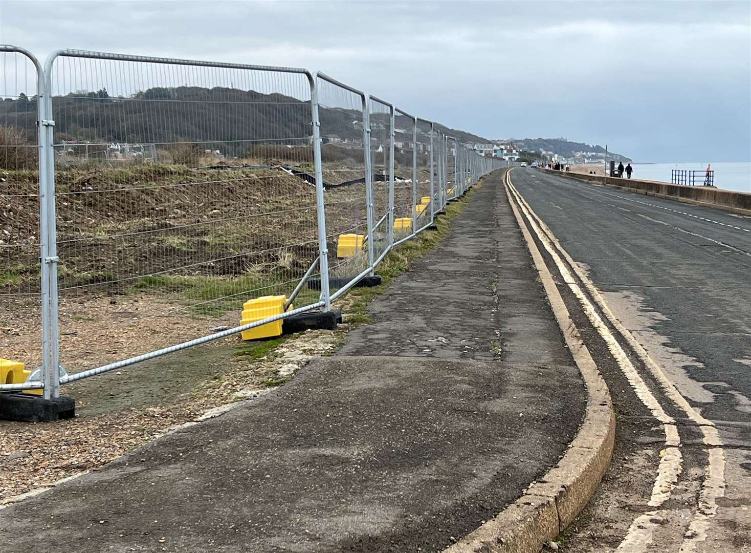 Fencing around the site of the development on the seafront in Hythe. Picture: Barry Goodwin
