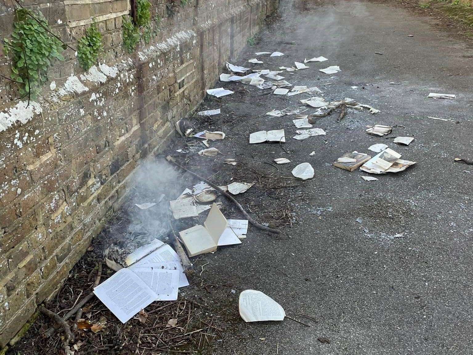 Burnt books on the railway bridge in River, near Canterbury. Picture: Wendy Mackenzie