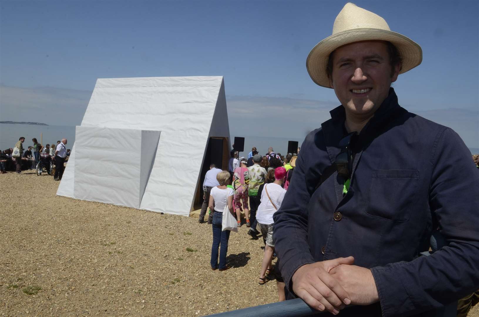 Artist Kieran Reed with his creation on the beach at Cushings View at the start of the 2014 Whitstable Biennale