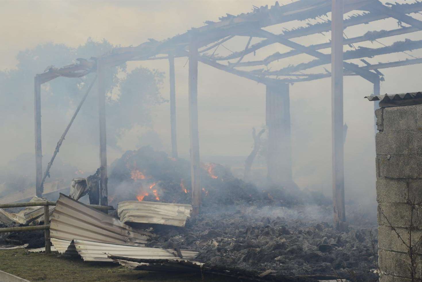 The burnt out shell of one of the barns in Minster. Picture: Chris Davey