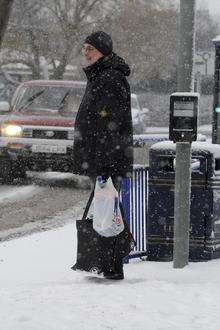A shopper takes home his supplies in Bridge Road, Sheerness