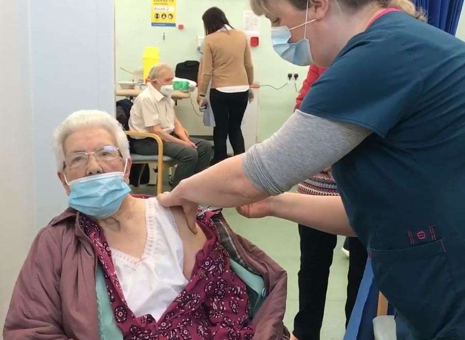 Winifred Prett receiving her Covid jab at Queen Victoria Memorial Hospital in Herne Bay in December - the first vaccine to be administered in the Canterbury district