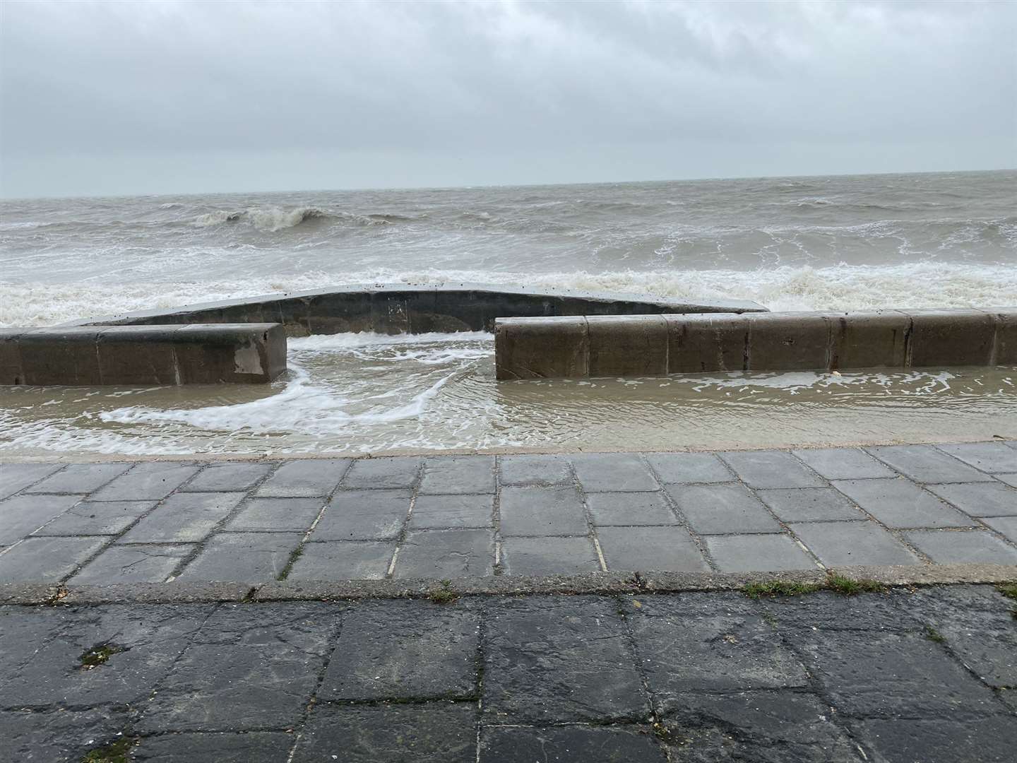 The waves are flowing over the sea wall in Sandgate. Pic: @Vixxta via Twitter (18013399)