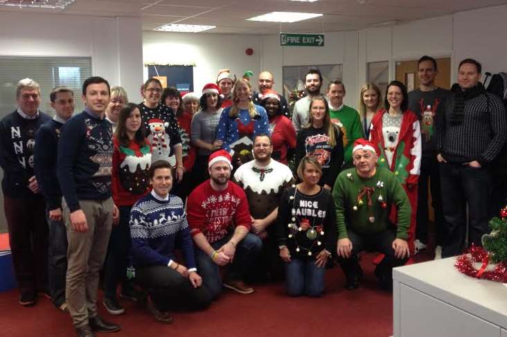 The team at the DFDS Seaways Dover office sporting seasonal knitwear