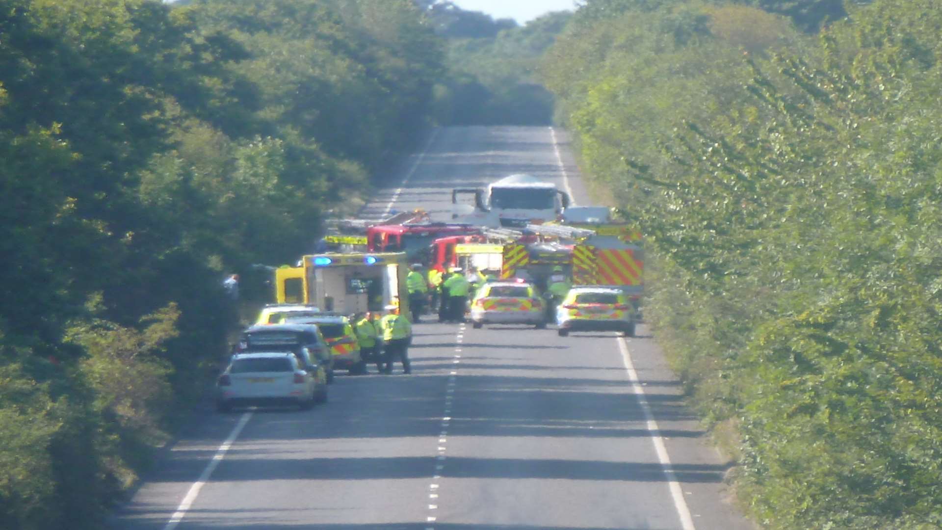 Emergency services at the scene of the horrific crash on the A2070 Hamstreet Road near Ashford in August 2014