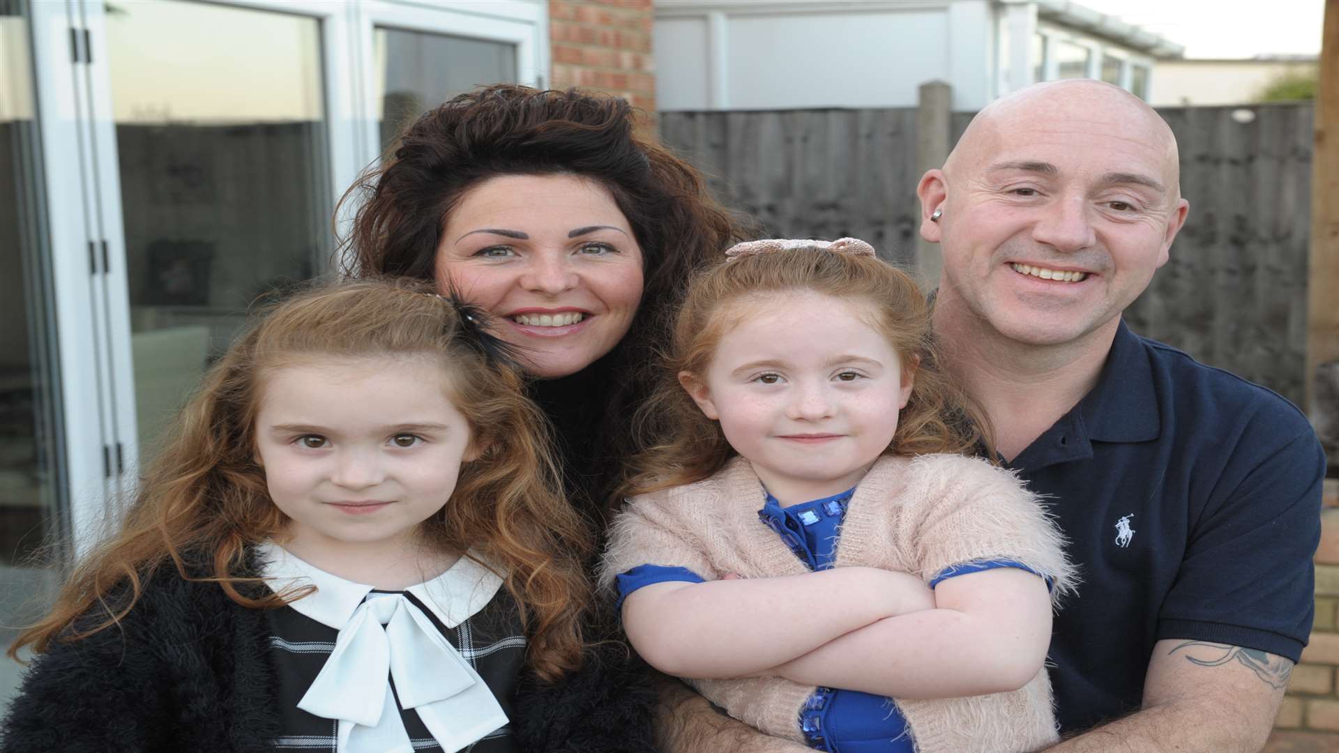 Cheryl East-Hickman and Ian Hickman with daughters Jocey (left) and Ellissia. Picture: Steve Crispe