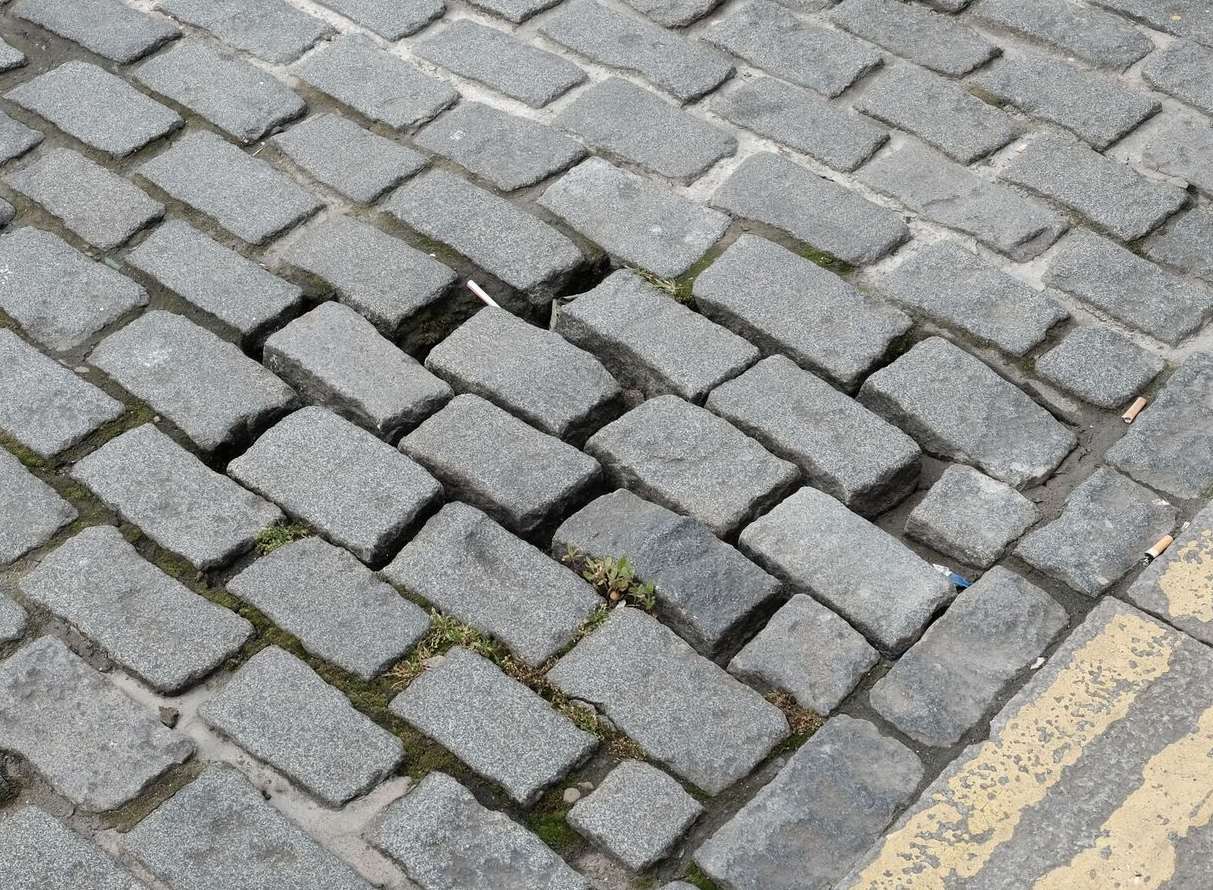 Loose cobble stones in the Broadway. Photo: James McKenzie.