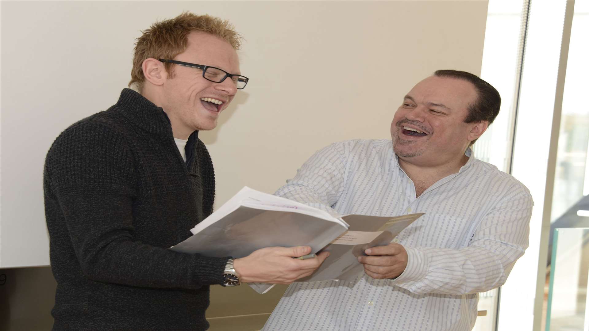 Lloyd Hollett and Shaun Williamson share a joke during rehearsals