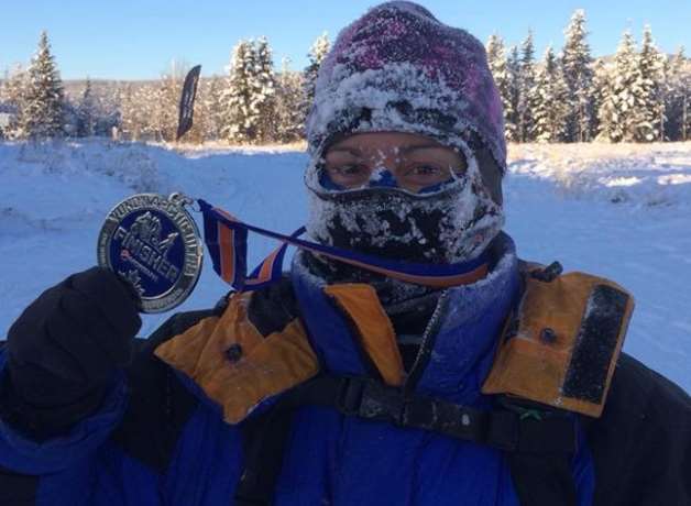 Michelle Smith, 38, pictured with her medal after coming fourth in the Montane Yukon Arctic Ultra marathon