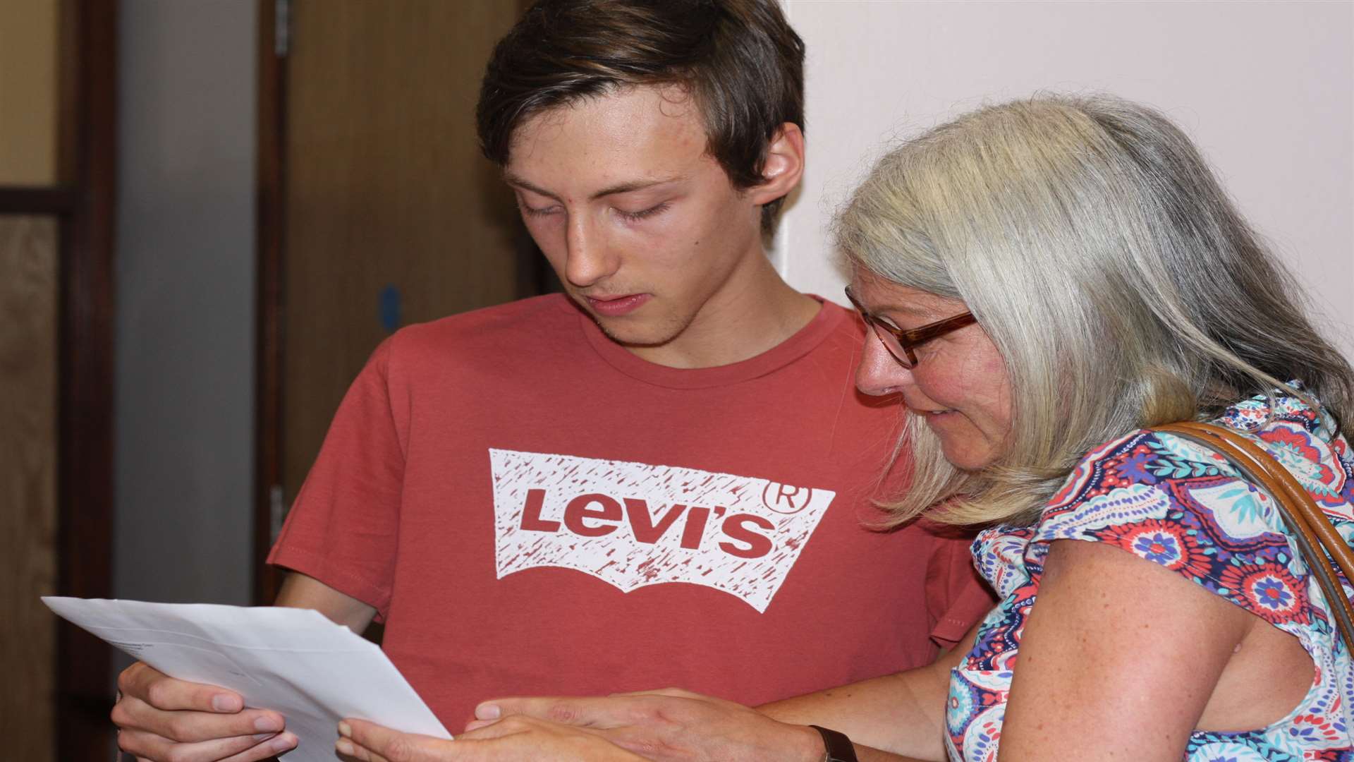 Ursuline College pupil Sam Ballard-Strevens and mum Sandra share news about his GCSE results. Picture: Mary Louis