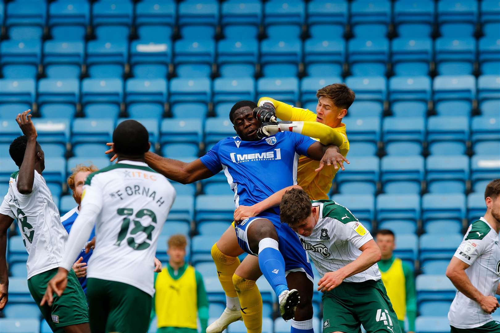John Akinde involved for the Gills against Plymouth on the final day of the season Picture: Andy Jones