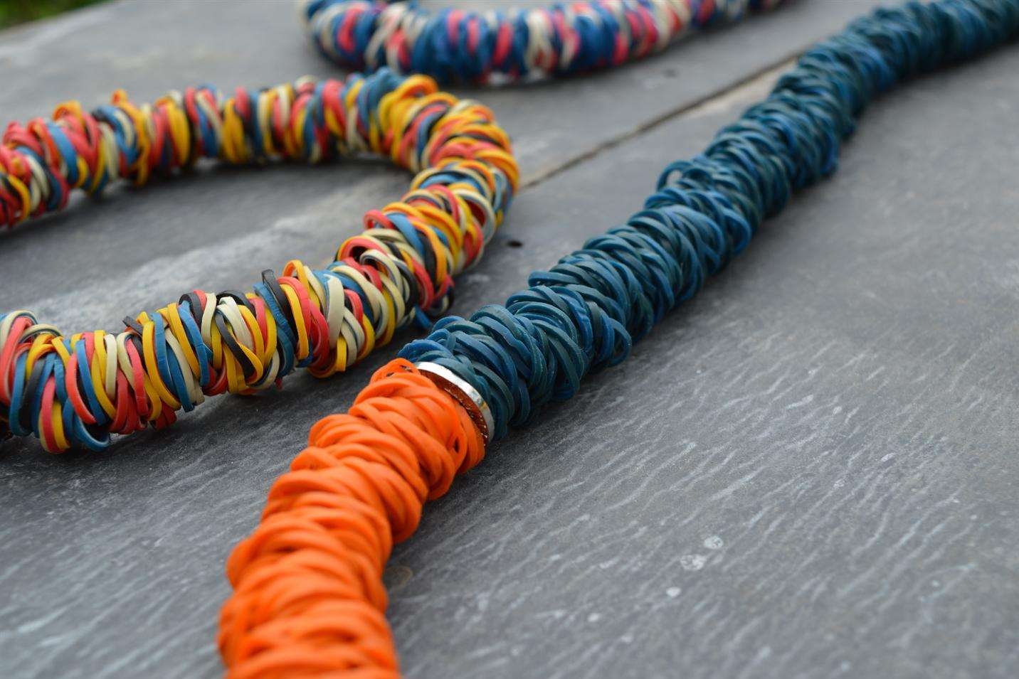 Necklaces made from natural latex rubber bands created in Kerala, India