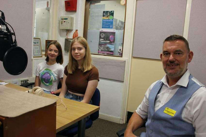 HRM-FM's Dolphin Beats presenters, Ellie and Brooke, with Dr George Findlay, chief executive, Medway NHS Foundation Trust. Picture: HRM-FM