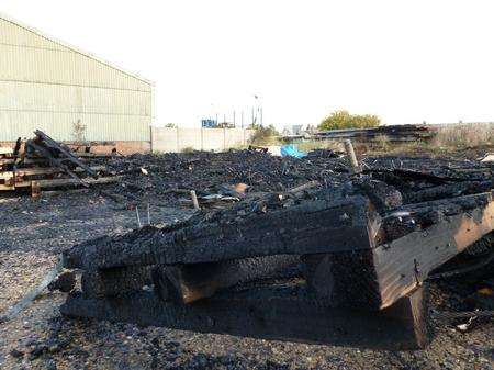 What was left of the timber after the blaze at Klondyke Industrial Estate