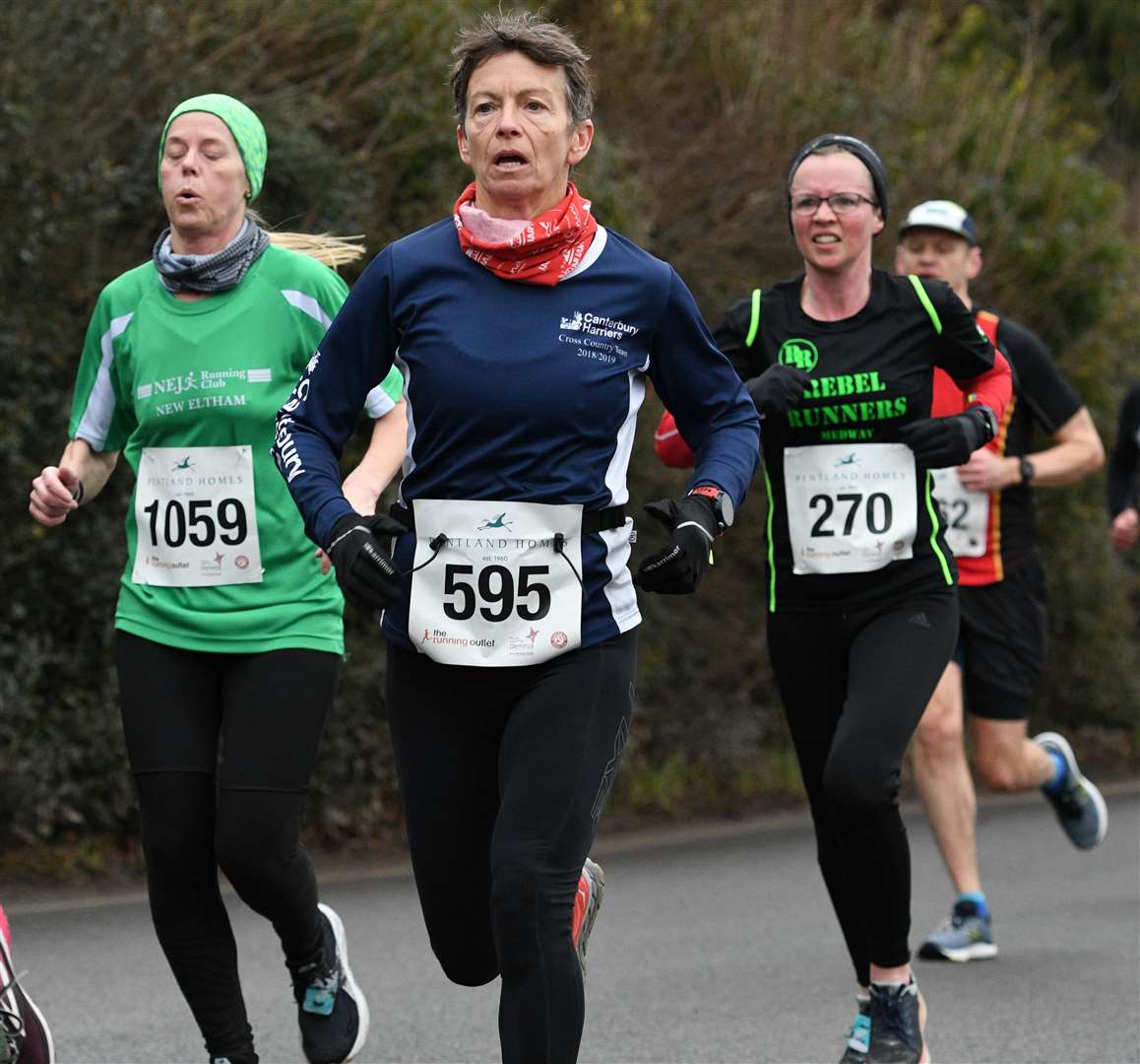 No.1059 Kelly Harris battles No.595 Claire Pluckrose of Canterbury Harriers and No.270 Sally Fry of Rebel Runners Medway. Picture: Barry Goodwin (54455330)