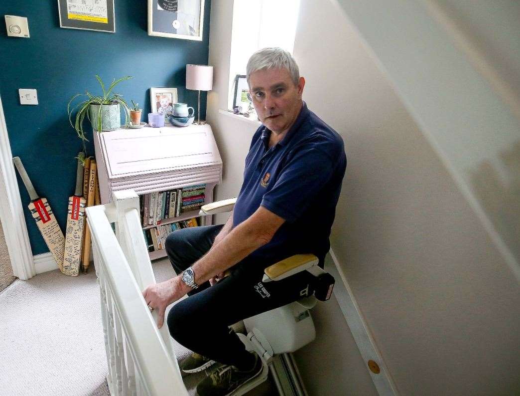 Alan Igglesden at home with his stairlift. Picture: Professional Cricketers' Trust