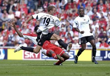 Dennis Rommedahl gets in front of Ugo Ehiogu to put Charlton ahead. Picture: MATTHEW WALKER