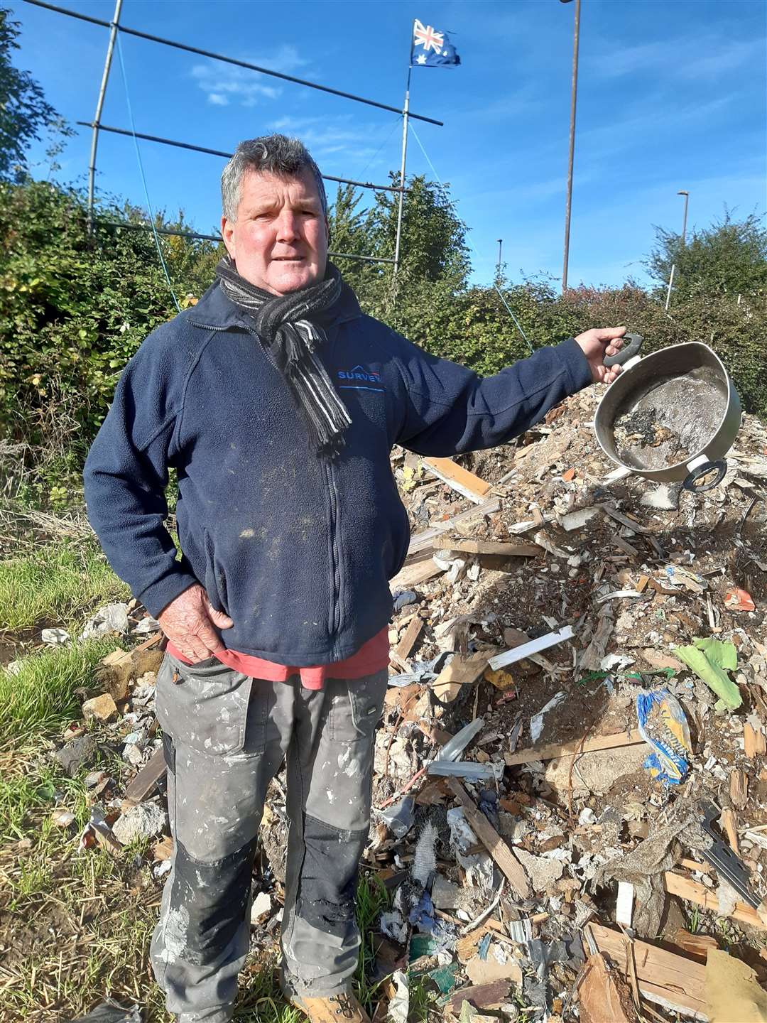 Car boot businessman Mark Greenfield with the discarded saucepan
