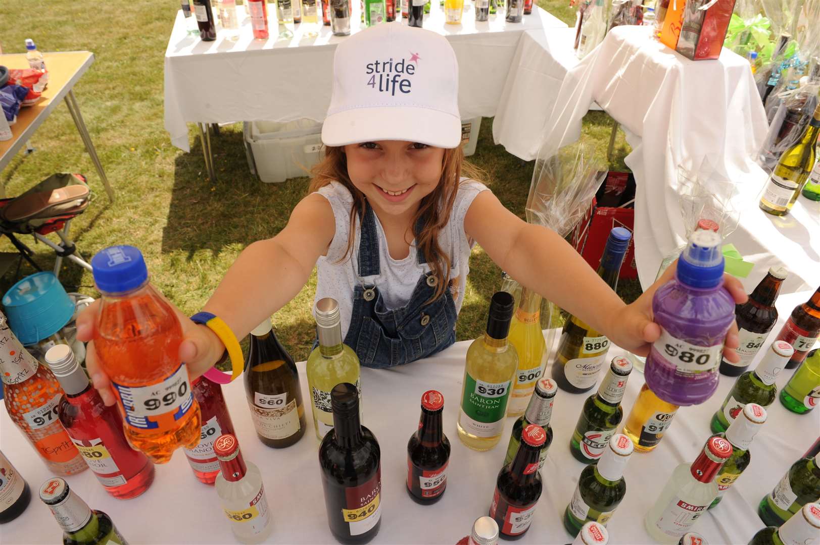 Ava Lane helps out on the tombola at last year's Stride4Life event. Picture: Steve Crispe